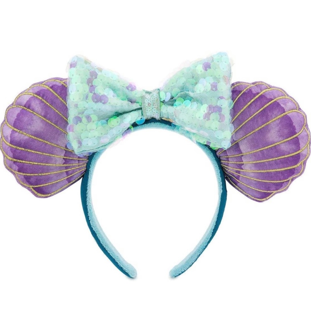 - little mermaid ear   Headband swims in the Disney park.  New